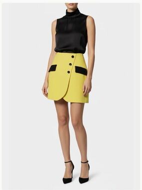 Dolce & Gabbana Yellow Mini Skirt with Black Trim